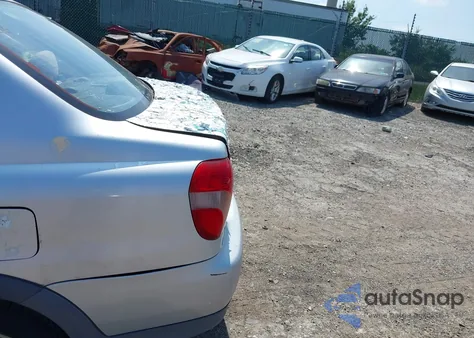 2000 Toyota Echo from USA, damaged, VIN JTDBT1230Y0002176